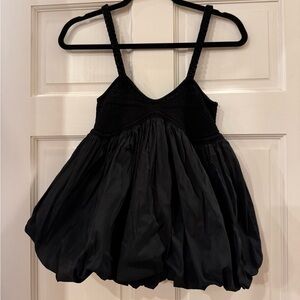 Fun black bubble top with knit details